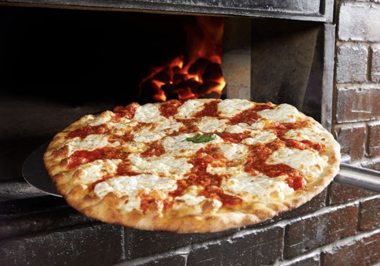Grimaldi's Pizzeria signature dishes Traditional Pizza
White With Garlic Pizza
Pesto Pizza